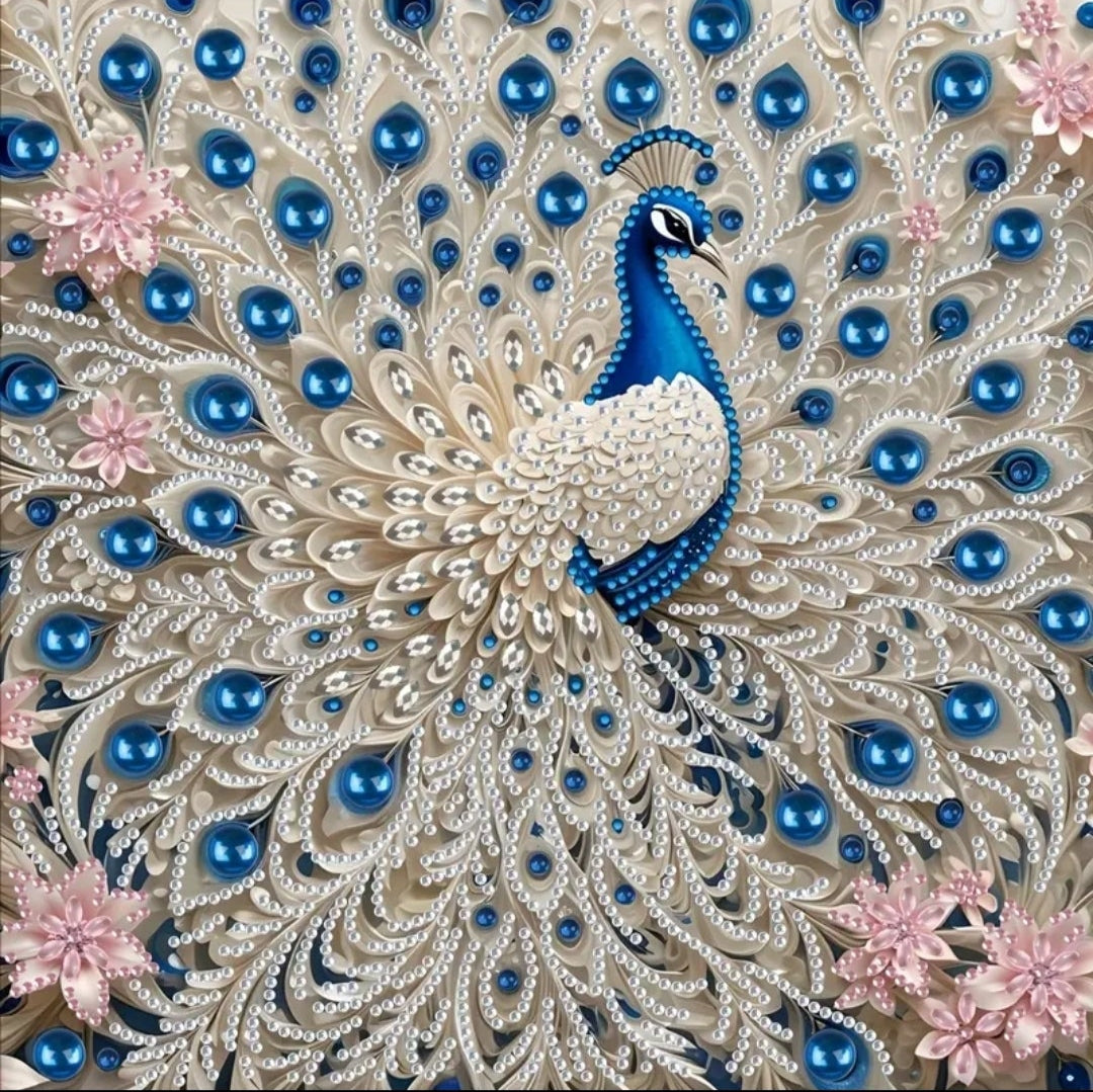 A close up of the diamond peacock detailing the high shine and quality of the beads as well as the intricacy of the piece. The bright blue white and pink diamonds sparkle giving this elegant piece every inch of glamour it deserves.