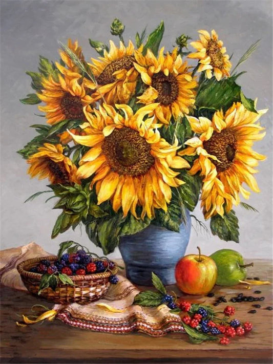 Diamond painting of a Bouquet of sunflowers in a blue vase on a wooden table with fruits and berries.