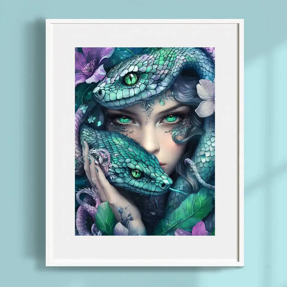 A vibrant and engaging Diamond painting of a mysterious woman with deep green eyes and 2 green snakes coiled around her in a minimalistic white frame mounted on a light blue wall. 