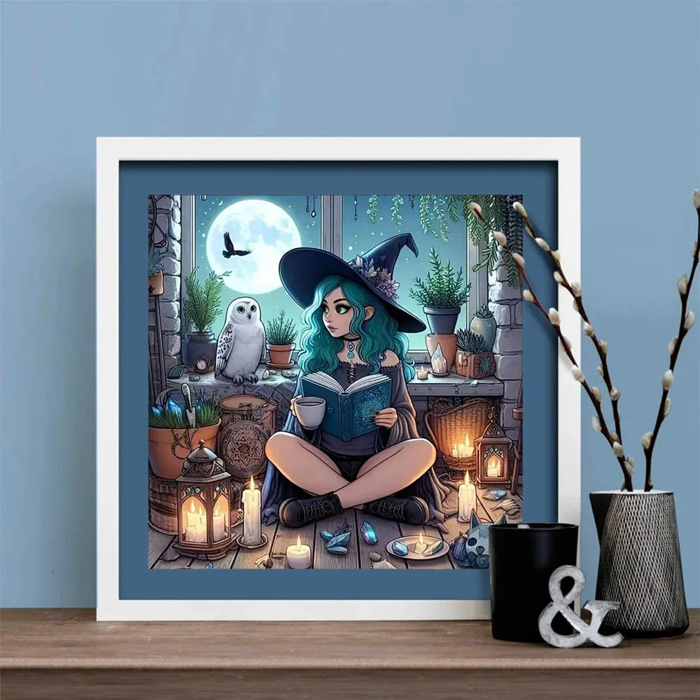 Framed diamond painting of a witch with blue hair reading a book in a cozy room with plants and candles.
