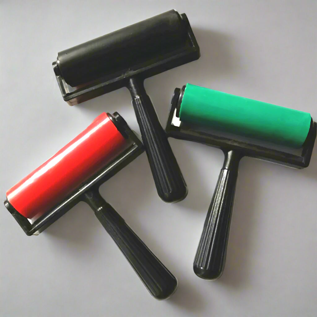 three high quality ergonomic plastic rollers to choose from red, green or black