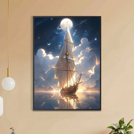 A dreamy picture of a large sailboat with white sales floating gently on a glass-like sea. The background is lit up with gold and navy colors and soft clouds cover the horizon that sits beneath a large glowing full moon. 