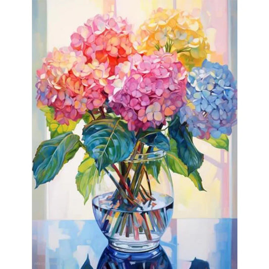 Colorful hydrangeas in a glass vase with a blurred background diamond painting kit
