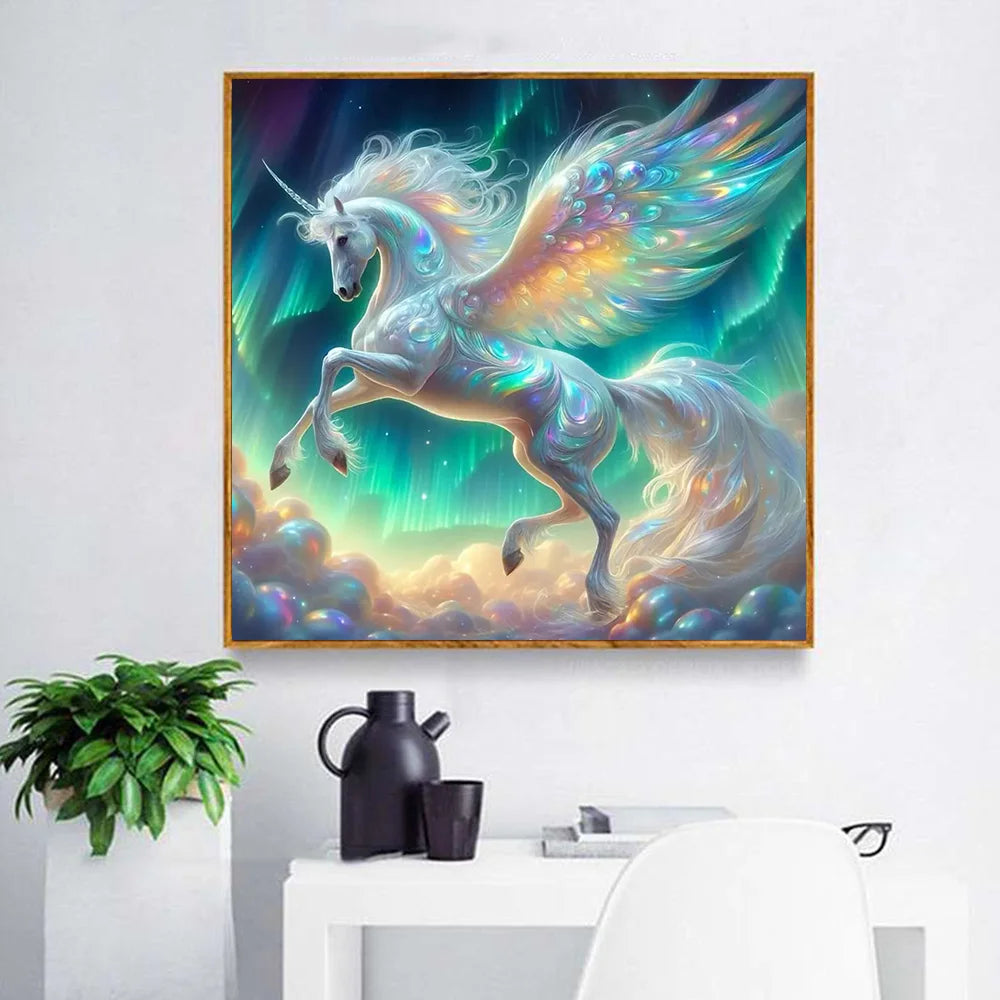 a sparkling unicorn diamond painting kit with the northern lights glowing in the background